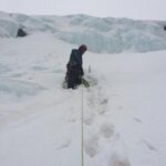 My belay stance at the end of 70M of rope, a convenient ice bulge for anchors