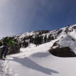 Todd pauses for a photo on the uphill slog in knee/waist deep snow