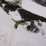 Todd poses for a pic halfway up the steep snow slope