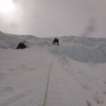 Todd above his first screw on the headwall